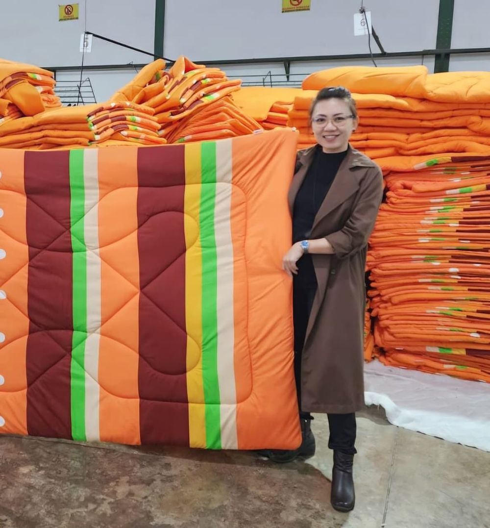 Merchandise and garment production output stacked at the Beruang workshop